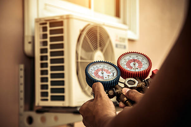 Professional Furnace Repair technician working in Gravette, AR